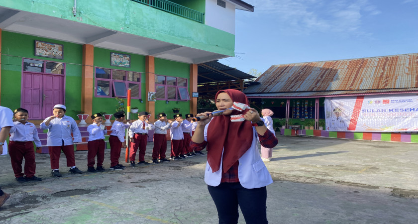 Penyuluhan Kessehatan Gigi Nasional 2024 di MI Alkhairaat Mogolaing